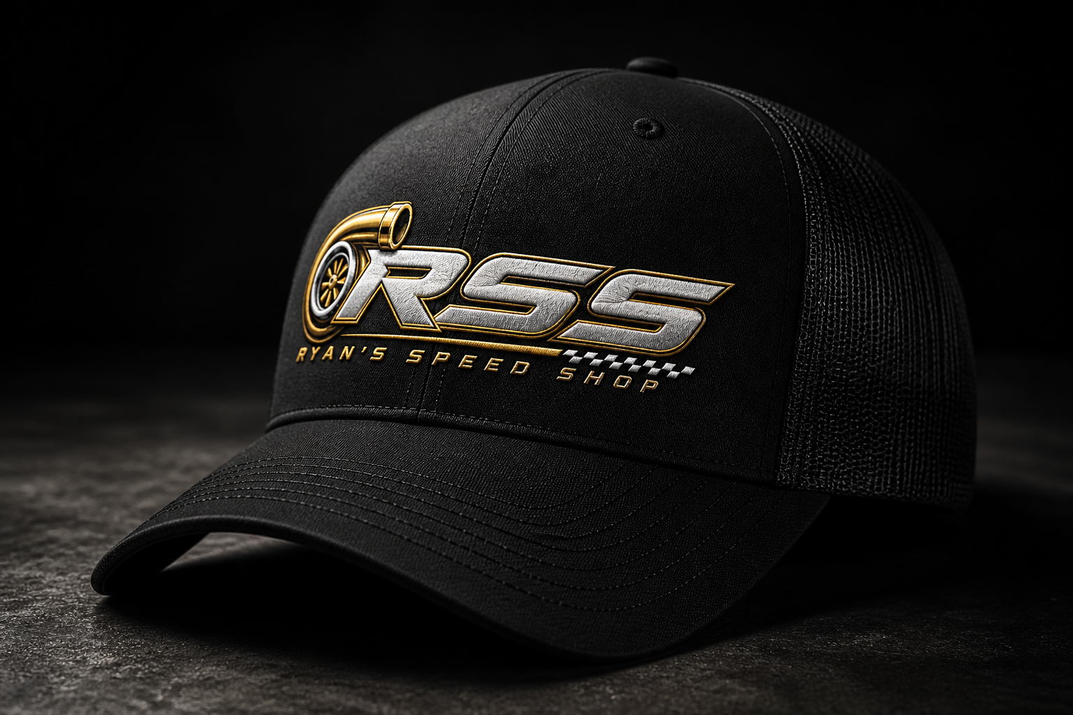 RSS Trucker Hat — Black with embroidered gold and silver RSS logo